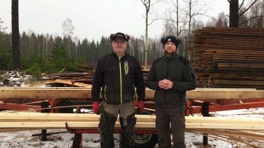 Simeon Fuchs and his father shows how to operate a Wood-Mizer sawmill outdoor in the winter